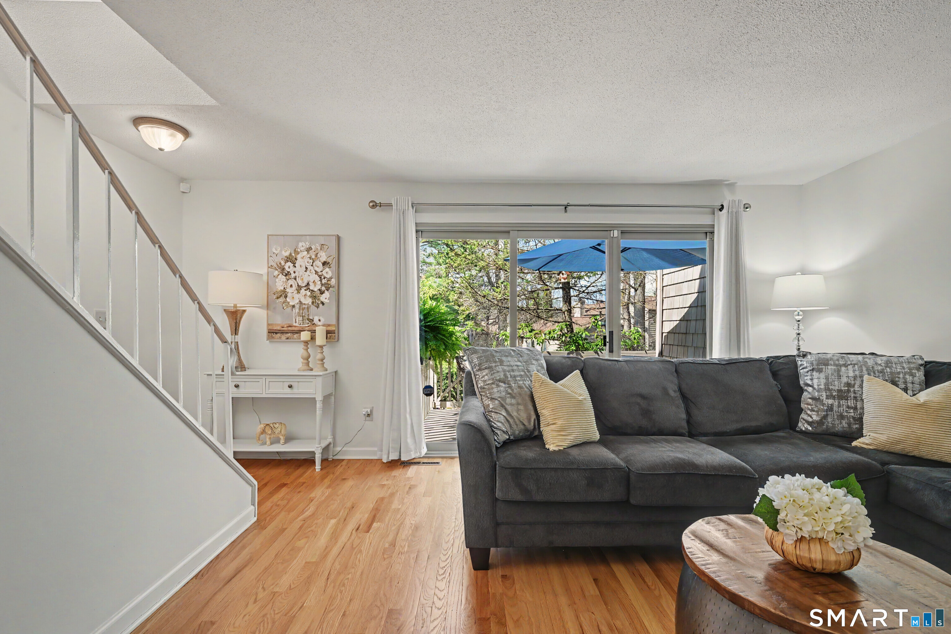 42 Powder Mill Road, Unit B Stratford, CT 06614 - Photo 6 of 40 Living Room with view of porch