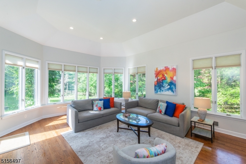 32 Parsonage Hill Road Short Hills, NJ 07078 - Photo 11 of 47 a living room with furniture and a large window