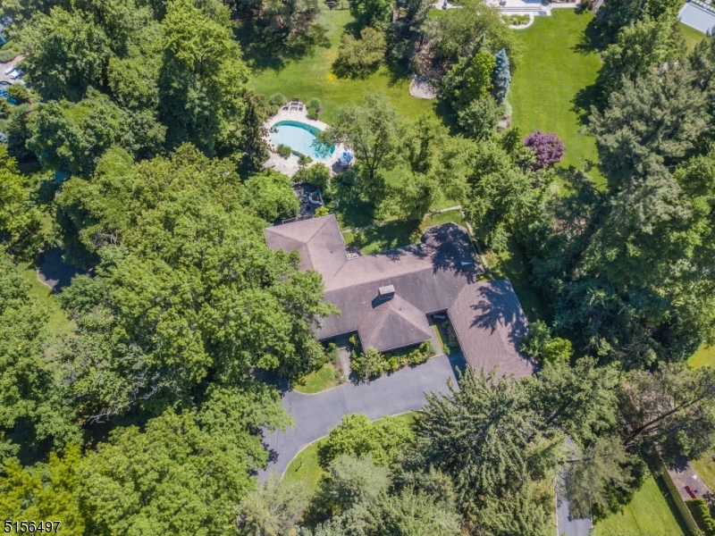 32 Parsonage Hill Road Short Hills, NJ 07078 - Photo 45 of 47 an aerial view of a house with a yard