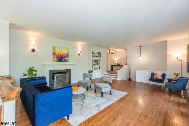 32 Parsonage Hill Road Short Hills, NJ 07078 - Photo 7 of 47 a living room with furniture and a fireplace