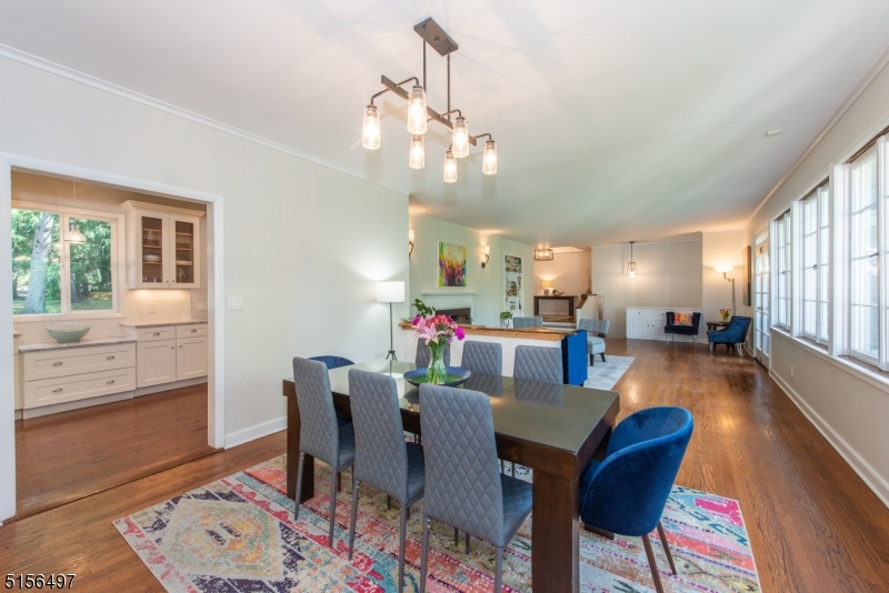 32 Parsonage Hill Road Short Hills, NJ 07078 - Photo 9 of 47 a view of a dining room with furniture and wooden floor