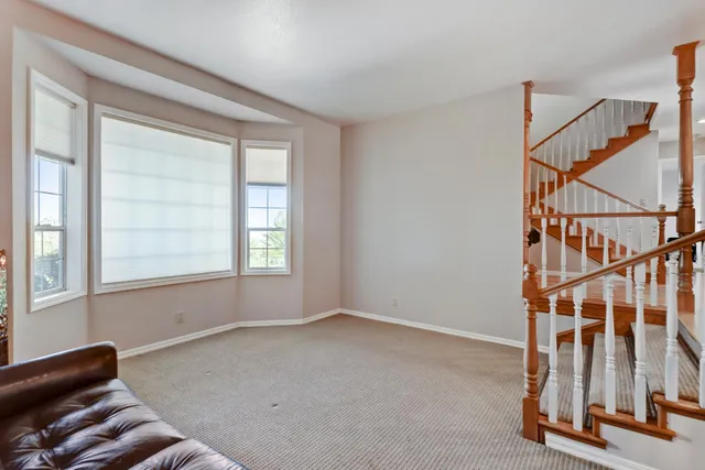 a bathroom with a shower and a sink