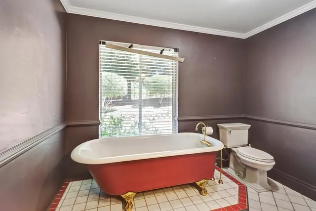a view of a patio with a table chairs and a backyard