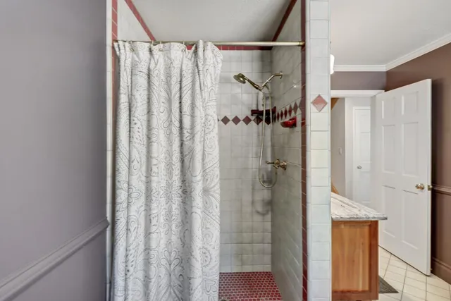 a view of a patio with a table chairs and a backyard