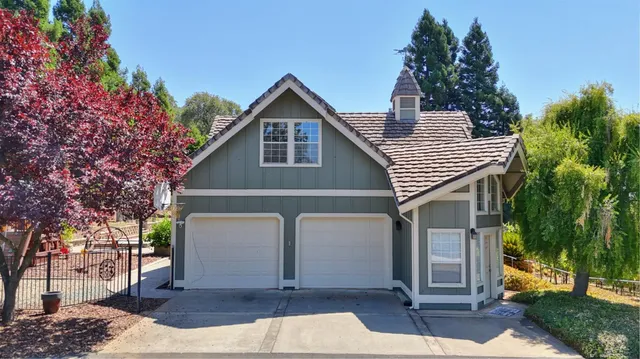 a kitchen with granite countertop a stove and a sink