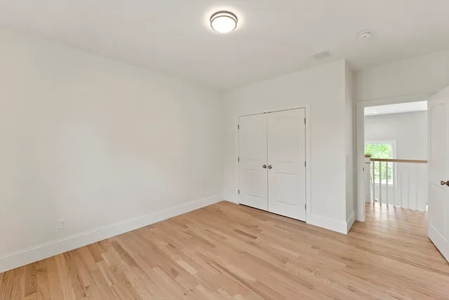 a bathroom with a shower and toilet