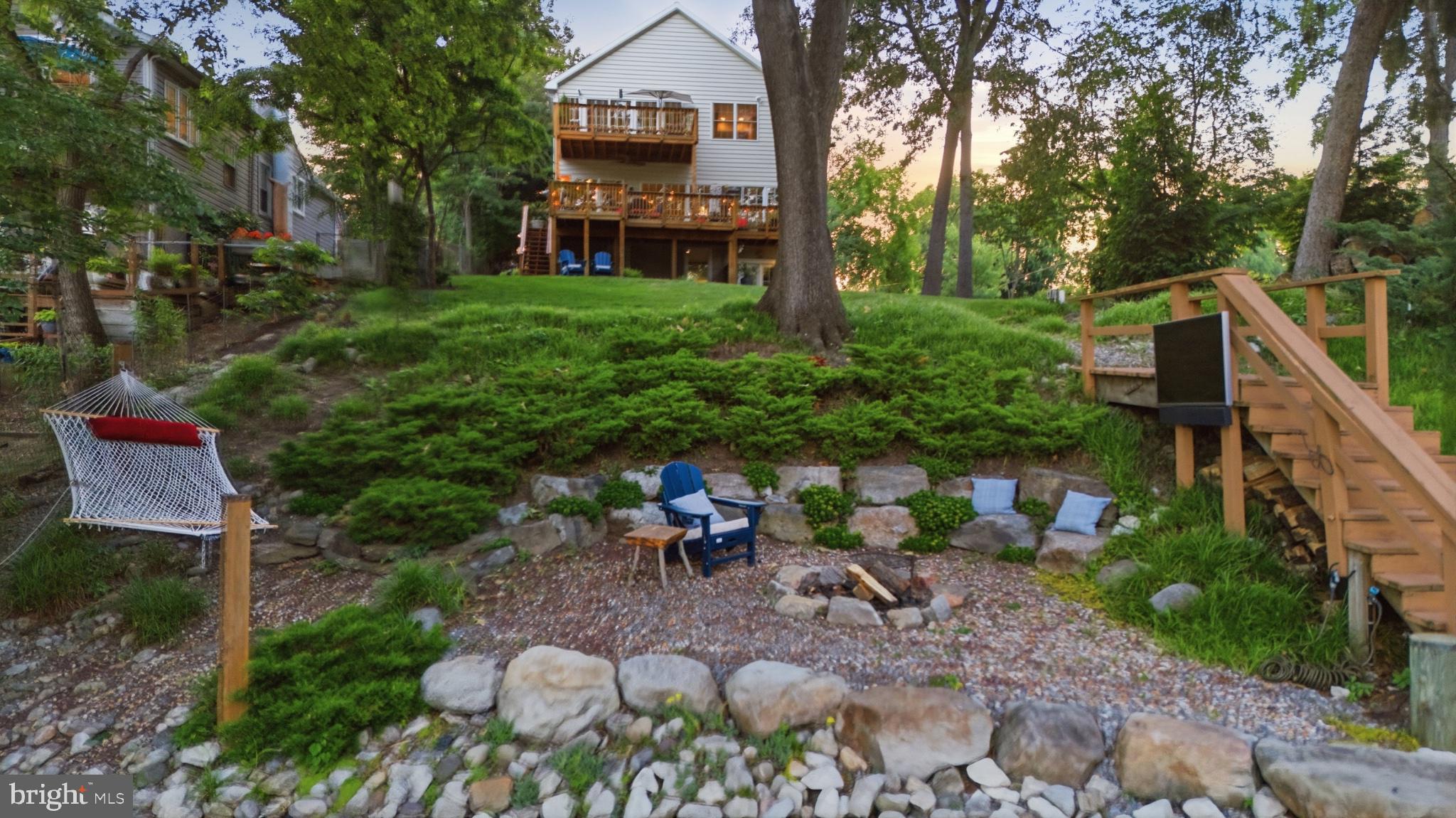 1219 Meadow View Road Pasadena, MD 21122 - Photo 70 of 70 Serene backyard retreat with fire pit.