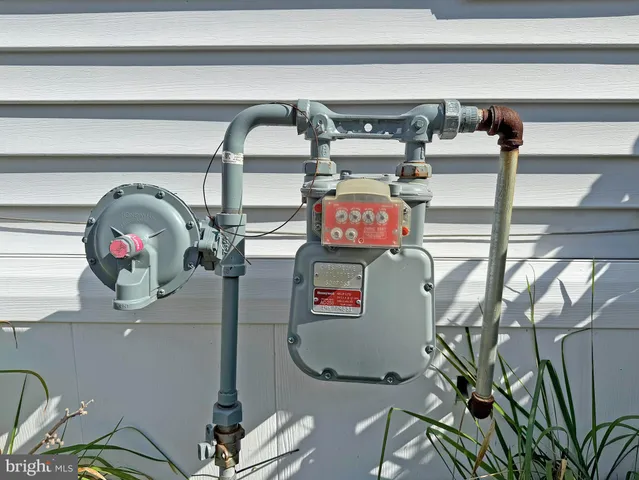 a view of a house with swimming pool and porch