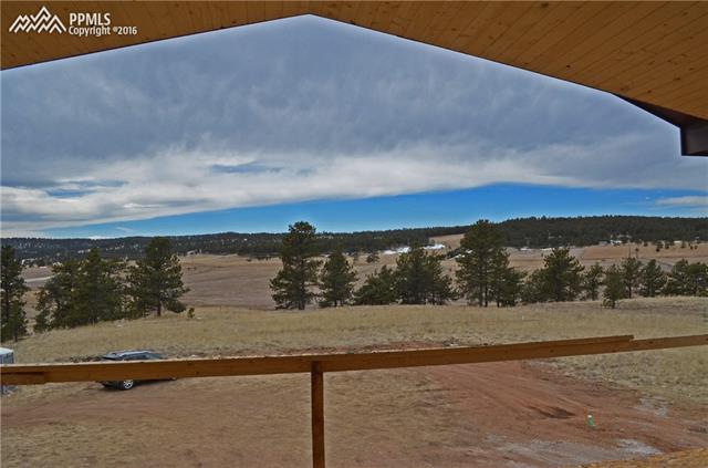 271 High Pasture Road Florissant, CO 80816 - Photo 4 of 7 Westerly VIEWS from Covered Deck (12ft x 24ft)