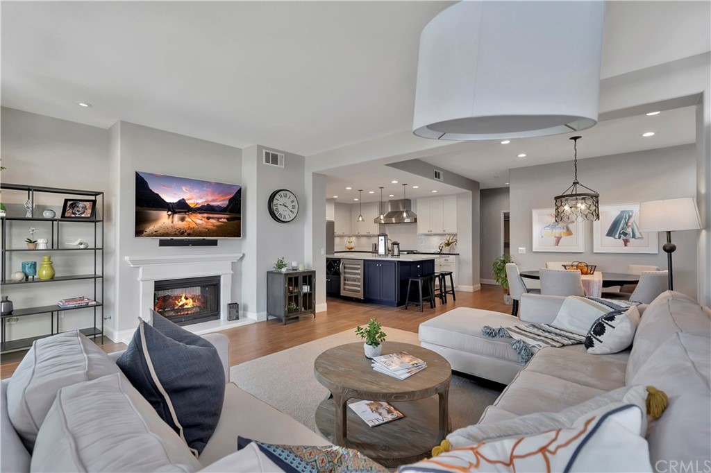 3235 Star Canyon Circle Corona, CA 92882 - Photo 13 of 75 a living room with fireplace furniture and a flat screen tv