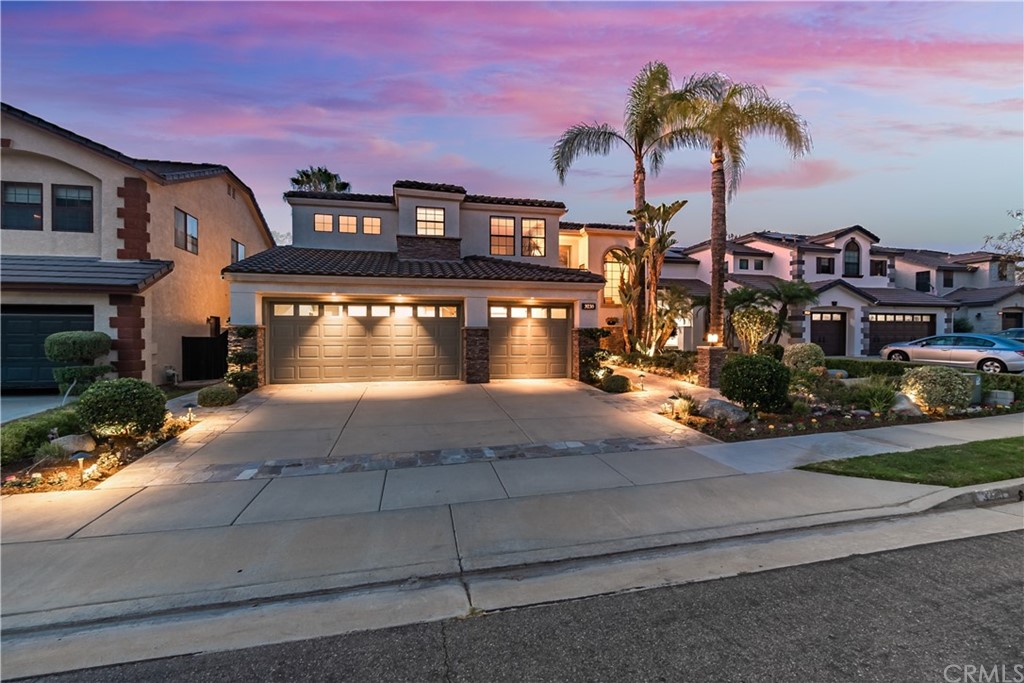 3235 Star Canyon Circle Corona, CA 92882 - Photo 2 of 75 a view of multiple houses with a yard