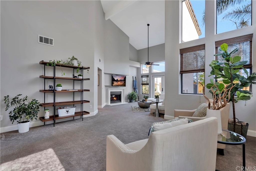3235 Star Canyon Circle Corona, CA 92882 - Photo 22 of 75 a living room with furniture cabinets and potted plant
