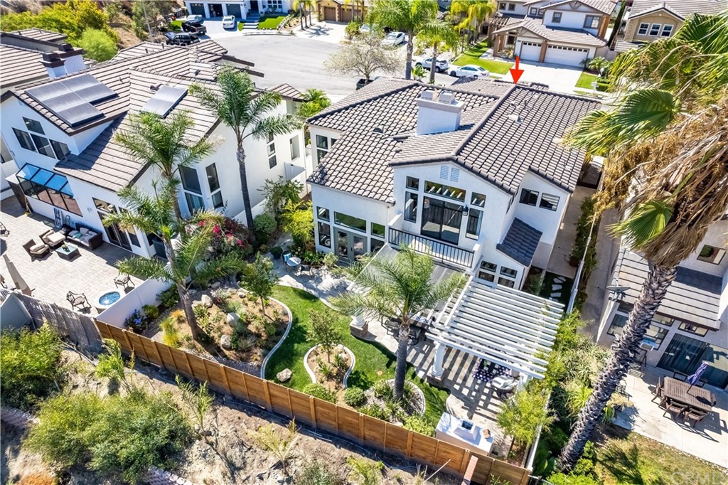 3235 Star Canyon Circle Corona, CA 92882 - Photo 35 of 75 an aerial view of a house with a yard and garden