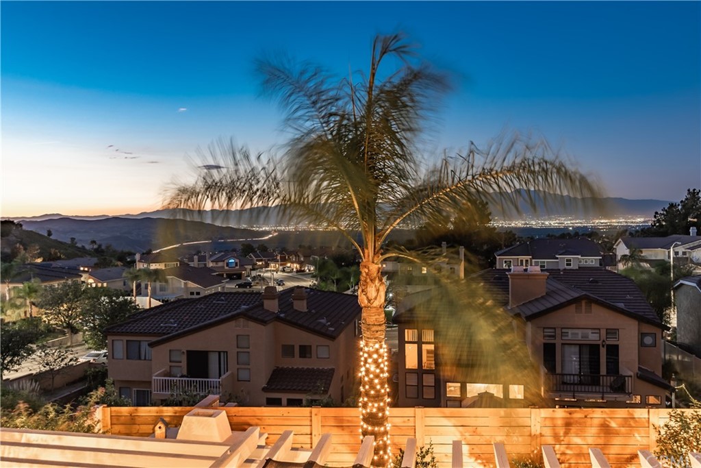 3235 Star Canyon Circle Corona, CA 92882 - Photo 49 of 75 a view of a house with a yard and balcony