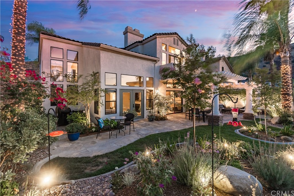 3235 Star Canyon Circle Corona, CA 92882 - Photo 5 of 75 a view of a house with a yard and a garden