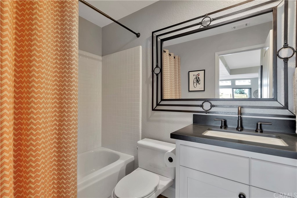 3235 Star Canyon Circle Corona, CA 92882 - Photo 58 of 75 a bathroom with a granite countertop sink toilet and shower