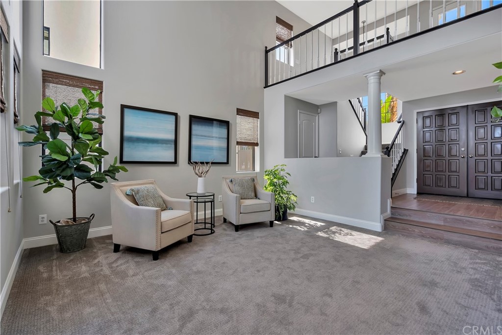3235 Star Canyon Circle Corona, CA 92882 - Photo 60 of 75 a living room with furniture and potted plant