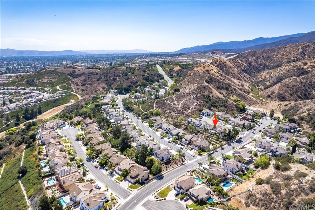 3235 Star Canyon Circle Corona, CA 92882 - Photo 74 of 75 an aerial view of residential houses with city view