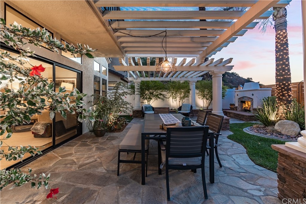 3235 Star Canyon Circle Corona, CA 92882 - Photo 8 of 75 a view of a porch with furniture and a yard