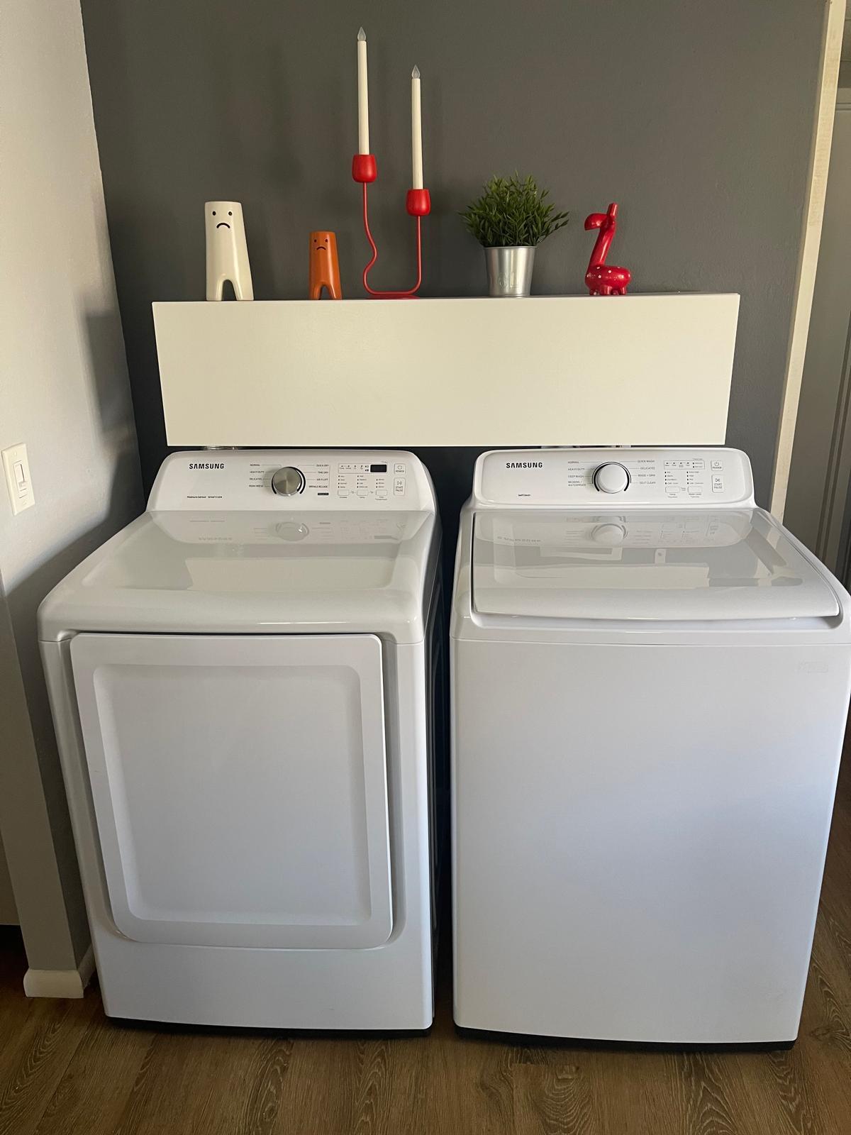E Saxony Lane East, Unit 230 Delray Beach, FL 33446 - Photo 12 of 22 a utility room with dryer and washer