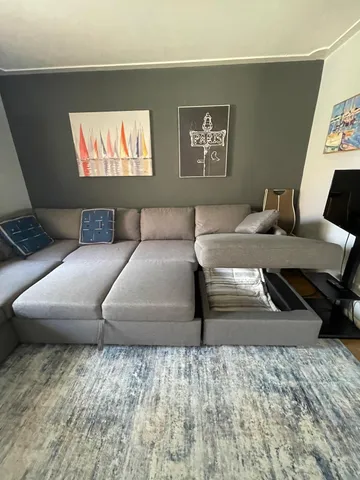 a living room with furniture and a couch