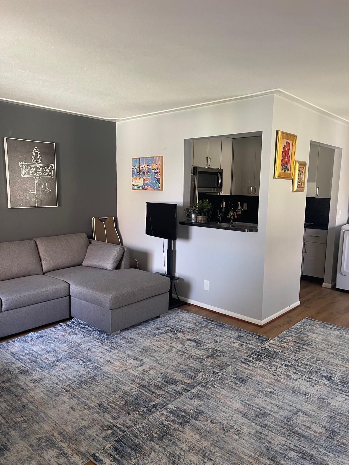 E Saxony Lane East, Unit 230 Delray Beach, FL 33446 - Photo 10 of 22 a living room with furniture and a couch