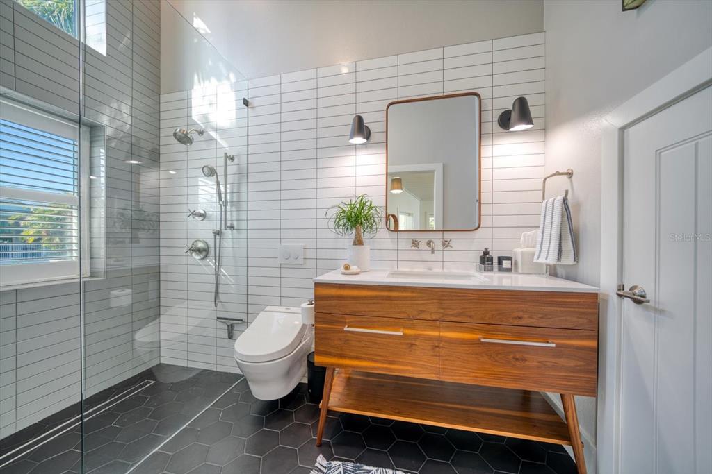 478 20th Avenue Indian Rocks Beach, FL 33785 - Photo 27 of 80 Guest bath with 14' ceiling