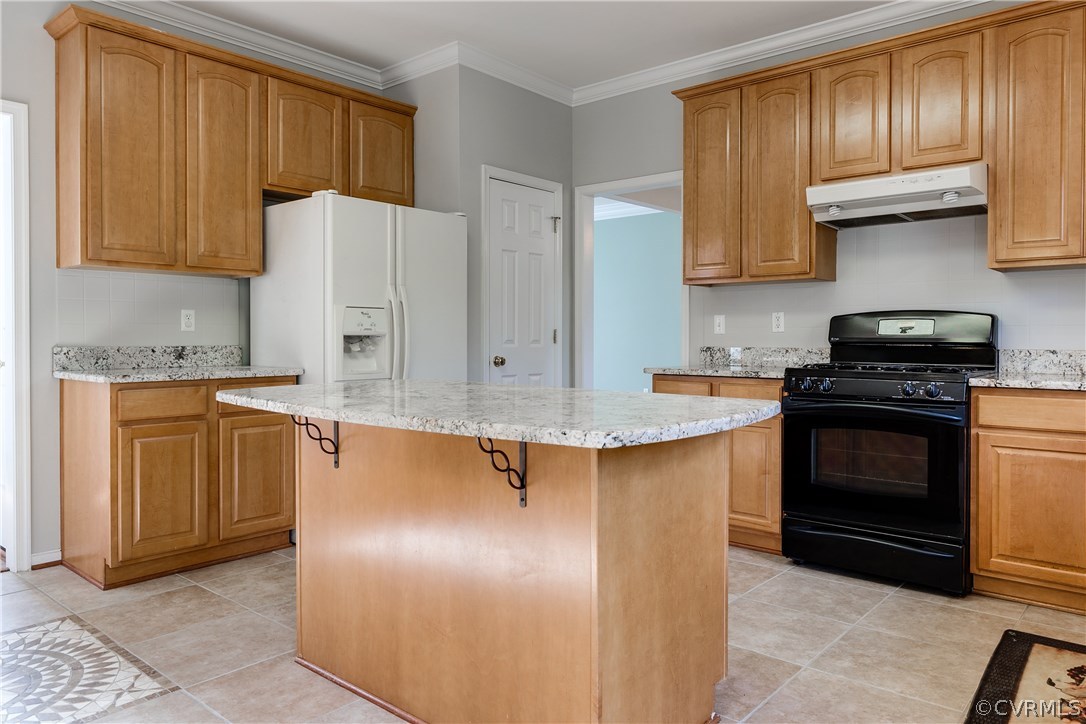 1418 Goswick Ridge Road Midlothian, VA 23114 - Photo 12 of 47 a kitchen with granite countertop cabinets and steel stainless steel appliances