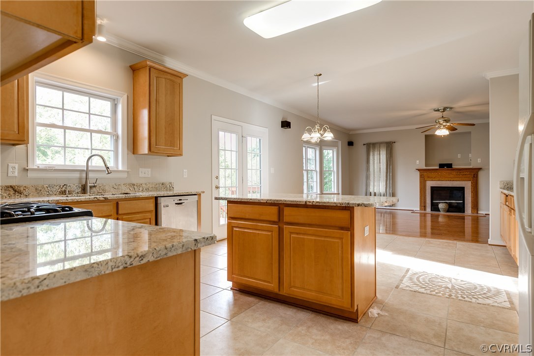 1418 Goswick Ridge Road Midlothian, VA 23114 - Photo 16 of 47 a large kitchen with granite countertop a sink dishwasher a stove and a refrigerator with wooden floor