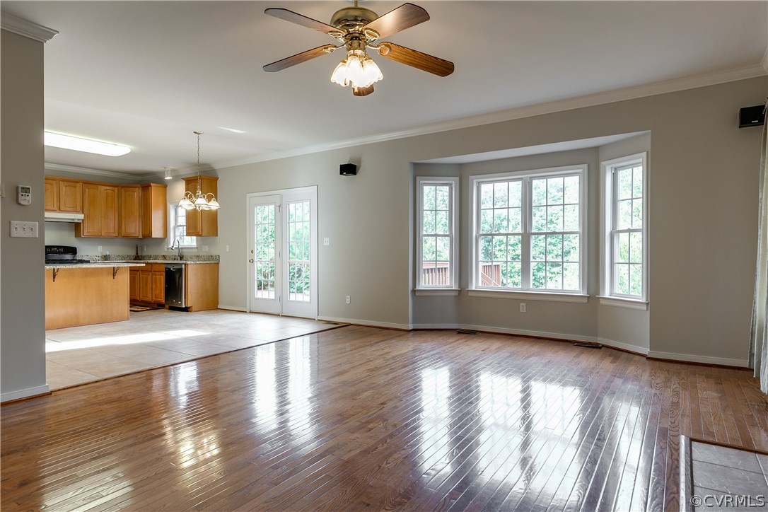 1418 Goswick Ridge Road Midlothian, VA 23114 - Photo 17 of 47 a view of an empty room with window and wooden floor