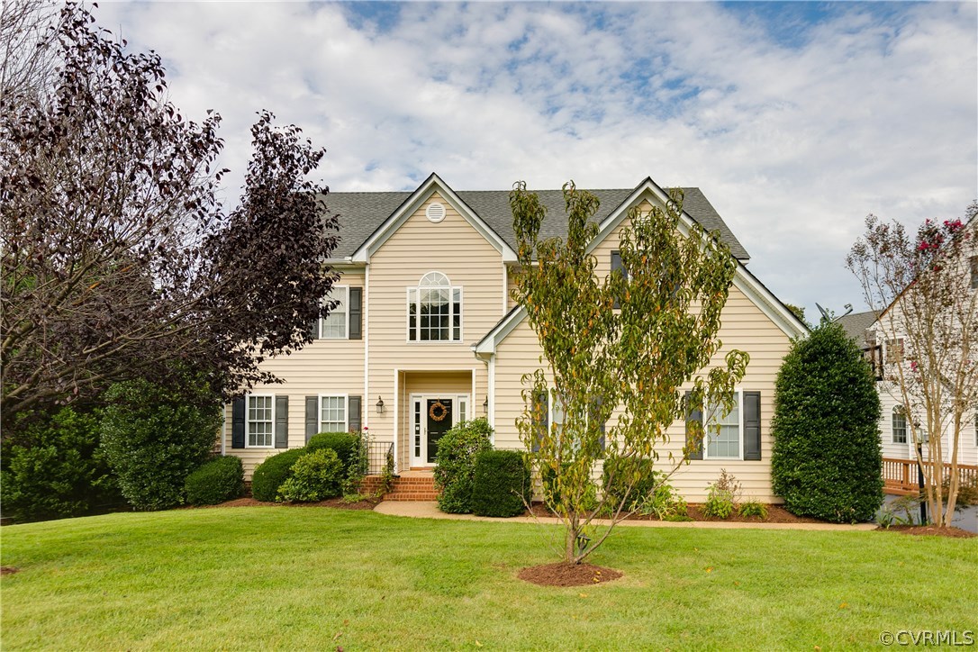 1418 Goswick Ridge Road Midlothian, VA 23114 - Photo 3 of 47 a front view of a house with a yard