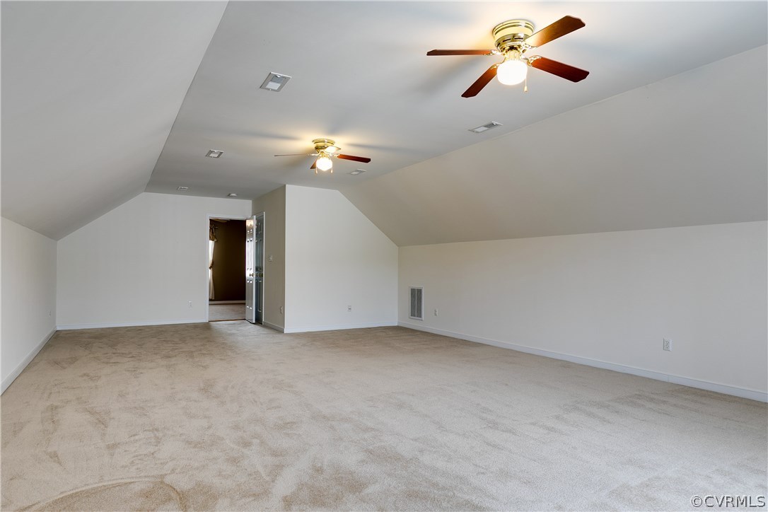 1418 Goswick Ridge Road Midlothian, VA 23114 - Photo 34 of 47 an empty room with chandelier fan and a ceiling fan