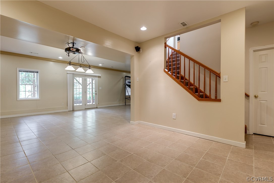 1418 Goswick Ridge Road Midlothian, VA 23114 - Photo 39 of 47 a view of a hallway with windows and chandelier