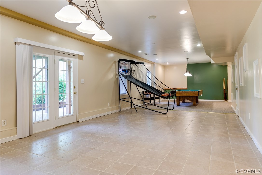 1418 Goswick Ridge Road Midlothian, VA 23114 - Photo 40 of 47 a room with lots of furniture and windows