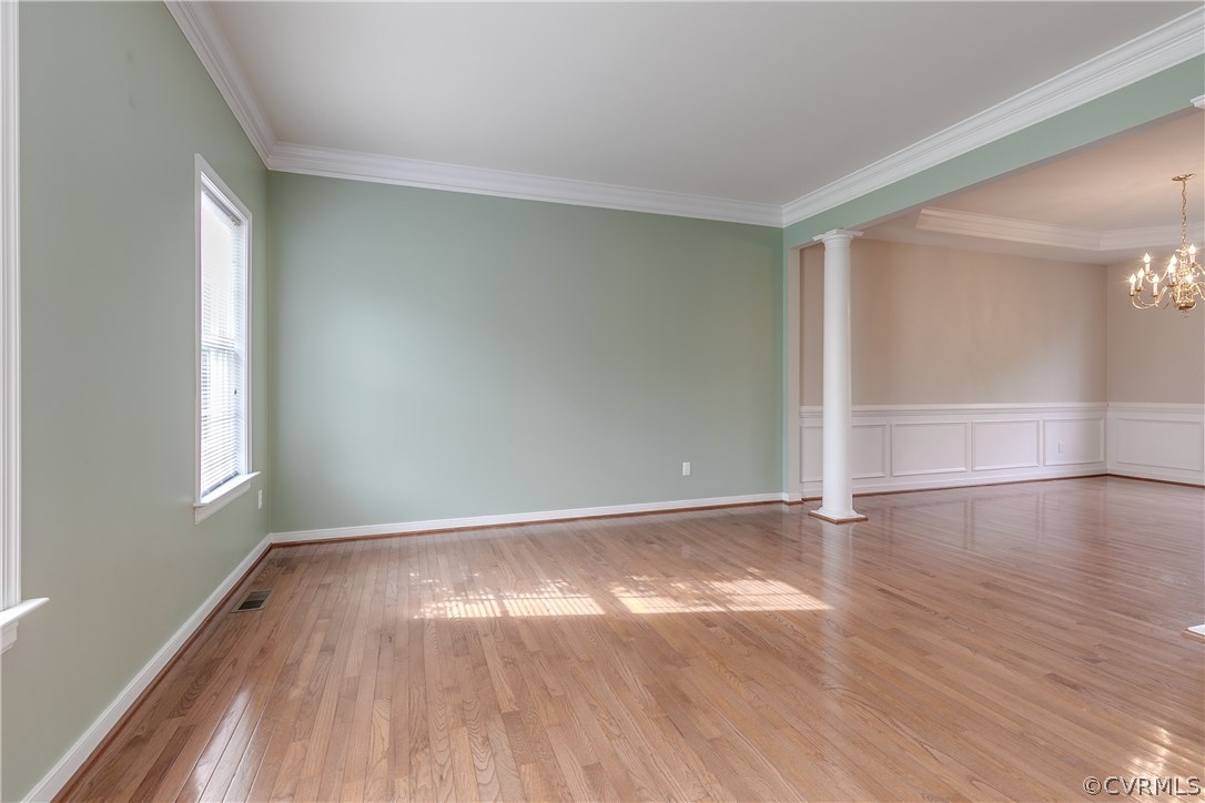 1418 Goswick Ridge Road Midlothian, VA 23114 - Photo 7 of 47 an empty room with wooden floor and windows