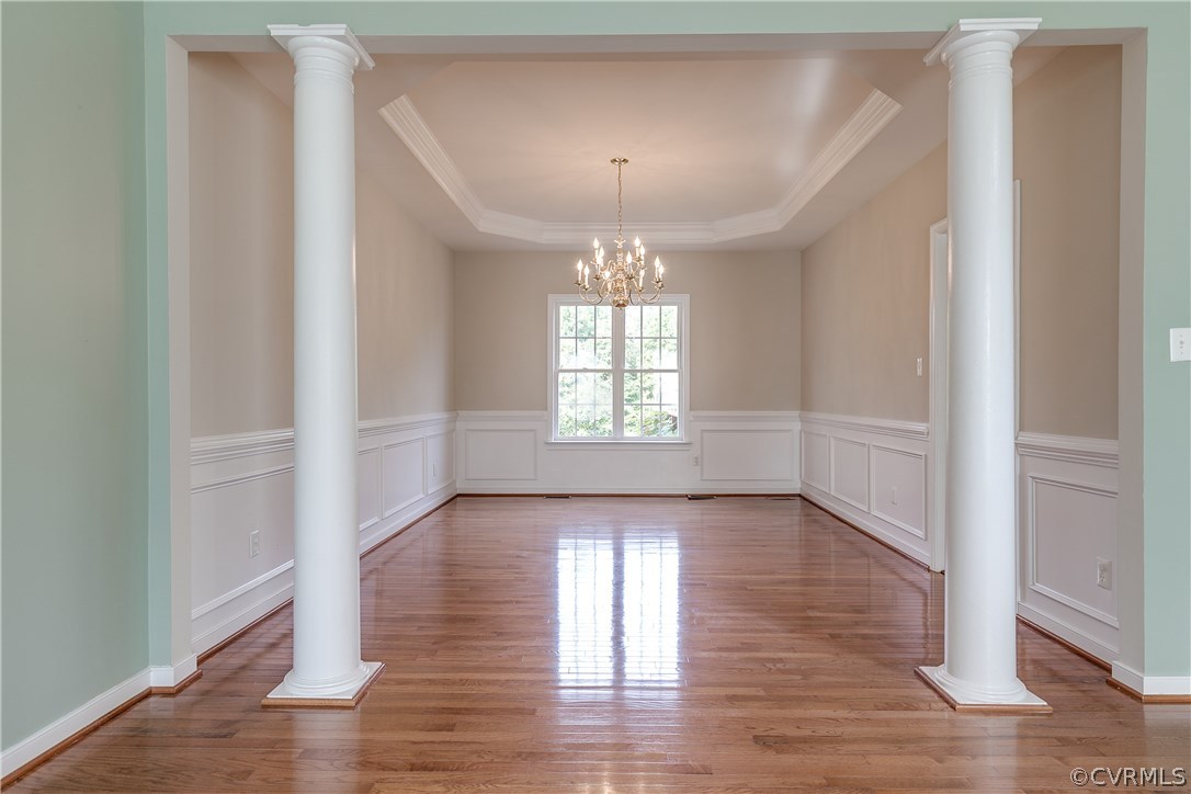 1418 Goswick Ridge Road Midlothian, VA 23114 - Photo 8 of 47 an empty room with wooden floor and windows