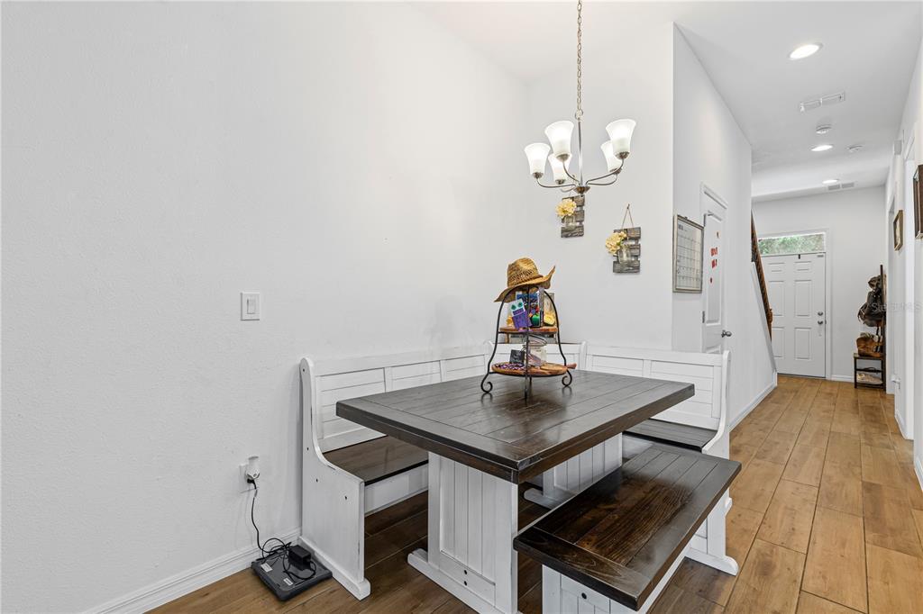 5119 Jones Road St. Cloud, FL 34771 - Photo 12 of 41 a view of kitchen with furniture and wooden floor