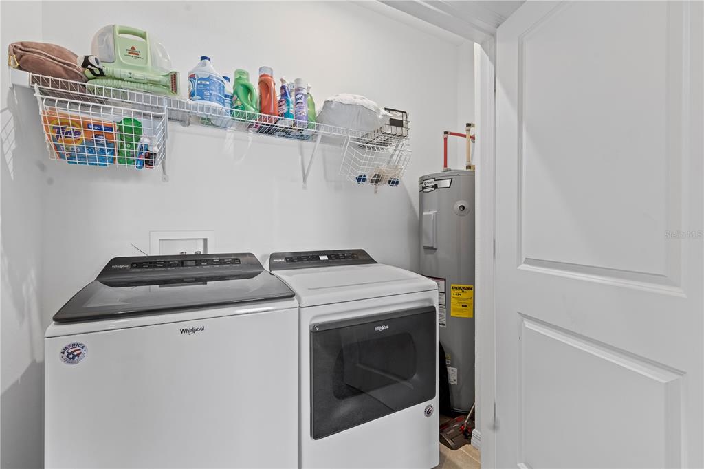 5119 Jones Road St. Cloud, FL 34771 - Photo 33 of 41 a utility room with dryer and washer