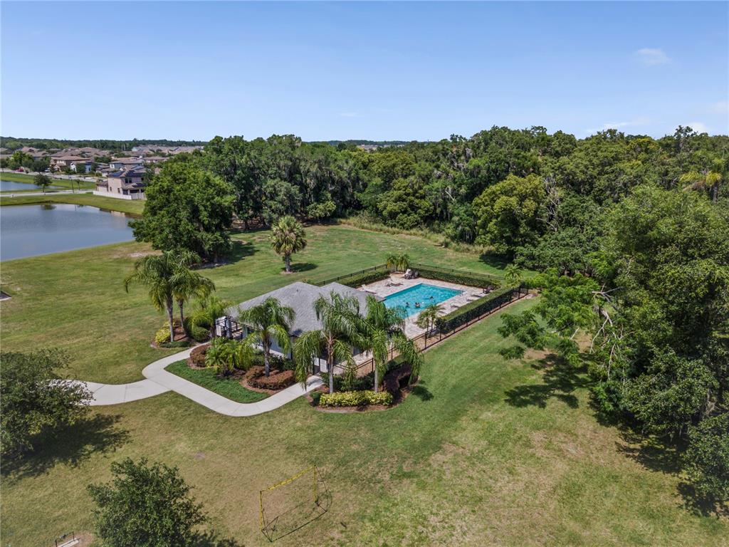 5119 Jones Road St. Cloud, FL 34771 - Photo 34 of 41 a view of a lake in middle of the forest