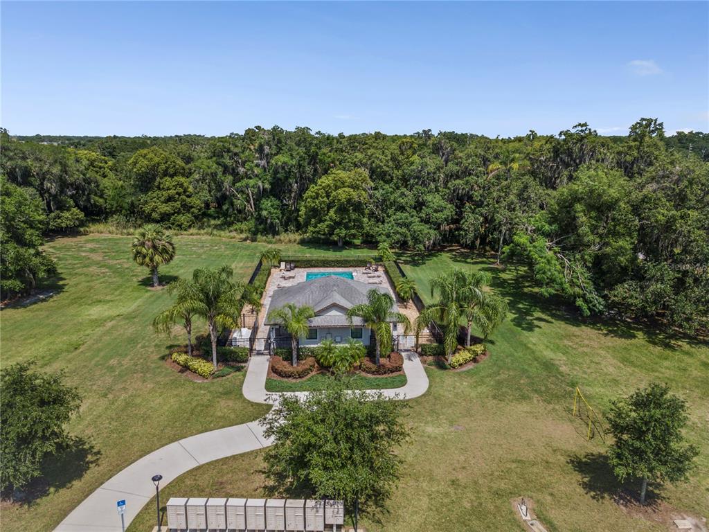 5119 Jones Road St. Cloud, FL 34771 - Photo 36 of 41 a view of a childrens park with large trees