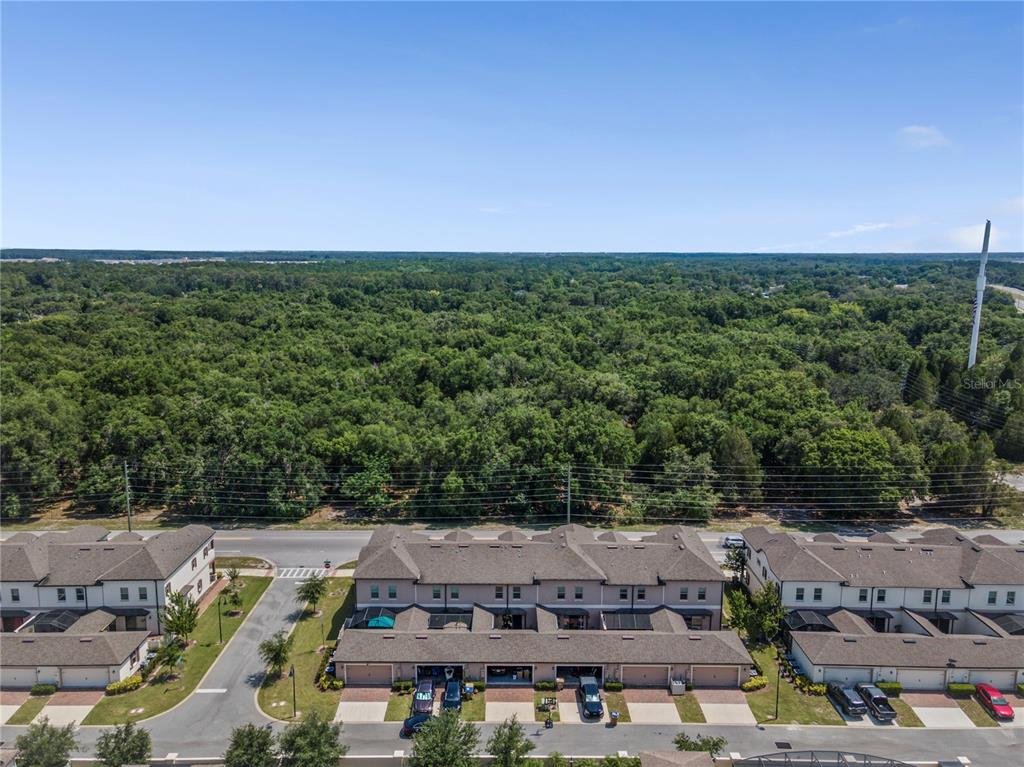 5119 Jones Road St. Cloud, FL 34771 - Photo 38 of 41 an aerial view of a house with a yard