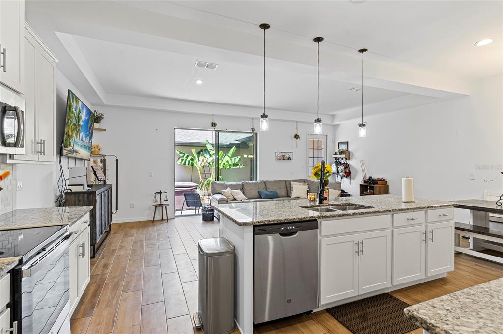 5119 Jones Road St. Cloud, FL 34771 - Photo 7 of 41 a kitchen with a sink and stove