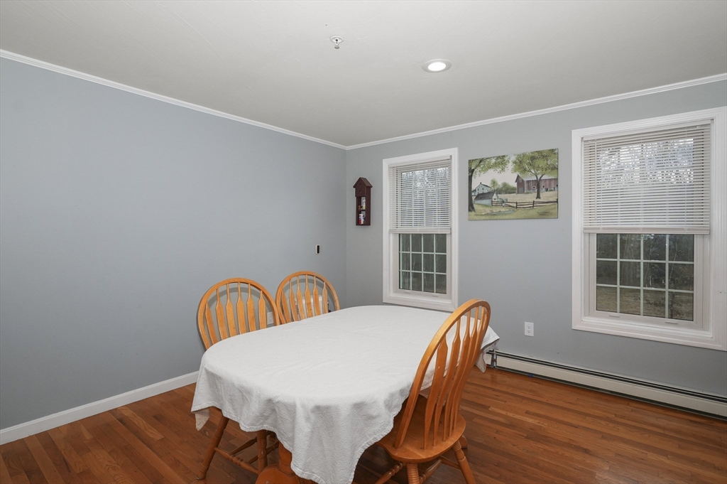 24 North End Road Townsend, MA 01469 - Photo 12 of 35 a view of a dining room with furniture and window