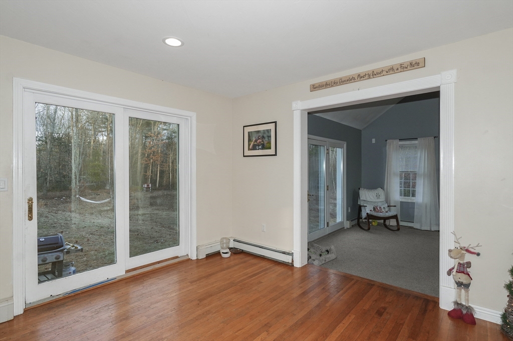 24 North End Road Townsend, MA 01469 - Photo 14 of 35 a view of room with window and wooden floor