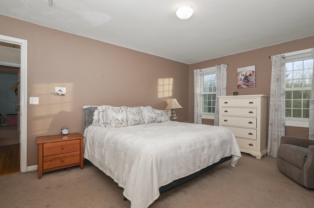 24 North End Road Townsend, MA 01469 - Photo 18 of 35 a bedroom with a bed and dresser