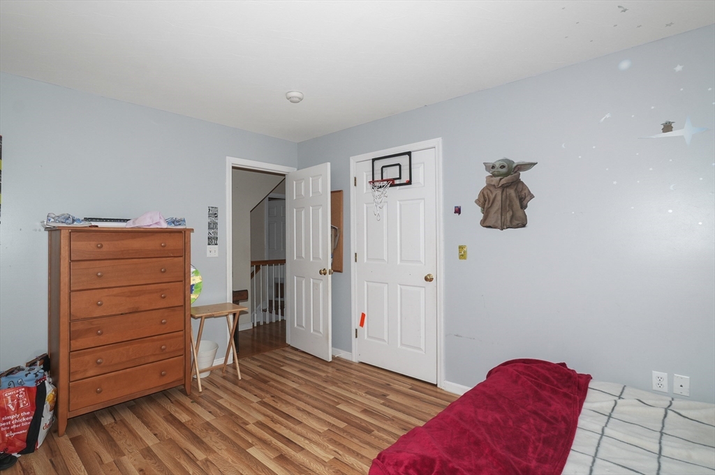 24 North End Road Townsend, MA 01469 - Photo 29 of 35 a bedroom with a bed and a dresser