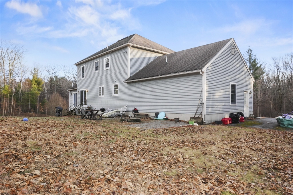 24 North End Road Townsend, MA 01469 - Photo 35 of 35 a view of a house with a yard