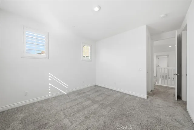 a view of a house with a snow in the yard