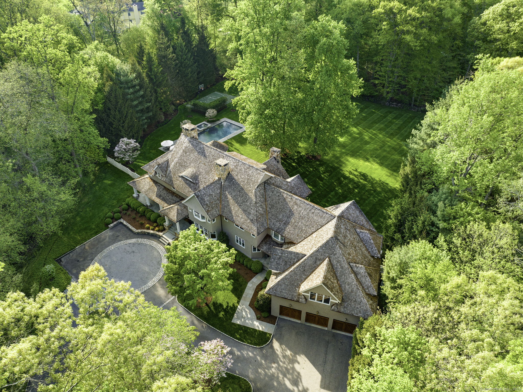 402 Spring Water Lane New Canaan, CT 06840 - Photo 1 of 1 an aerial view of a house with garden space and street view