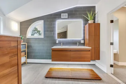 a view of room with window and walk in closet